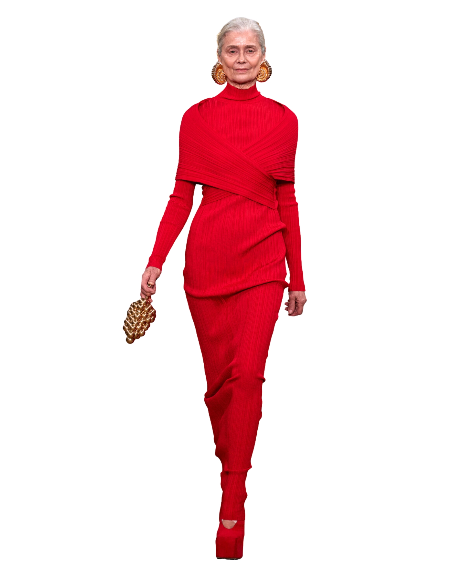 Balmain model wearing an all red look with big gold earrings and a gold grape bag