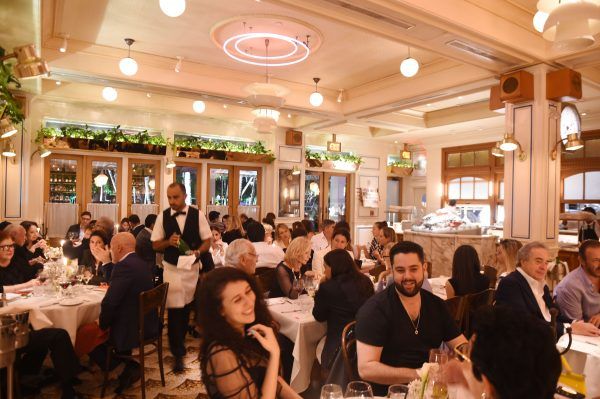 Guests enjoying a spectacular meal at Haute Cuisine hosted at Le Zoo Bal Harbour