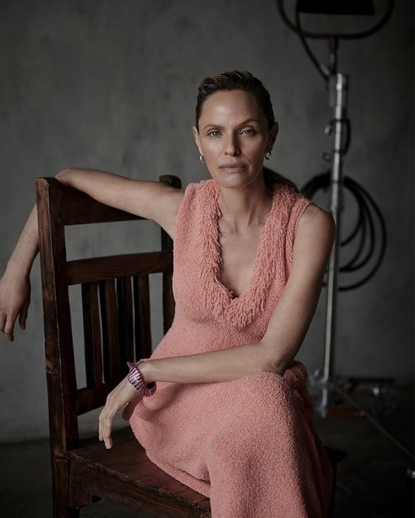 Rachel Roberts wears a Bottega Veneta dress, earrings and bracelet.