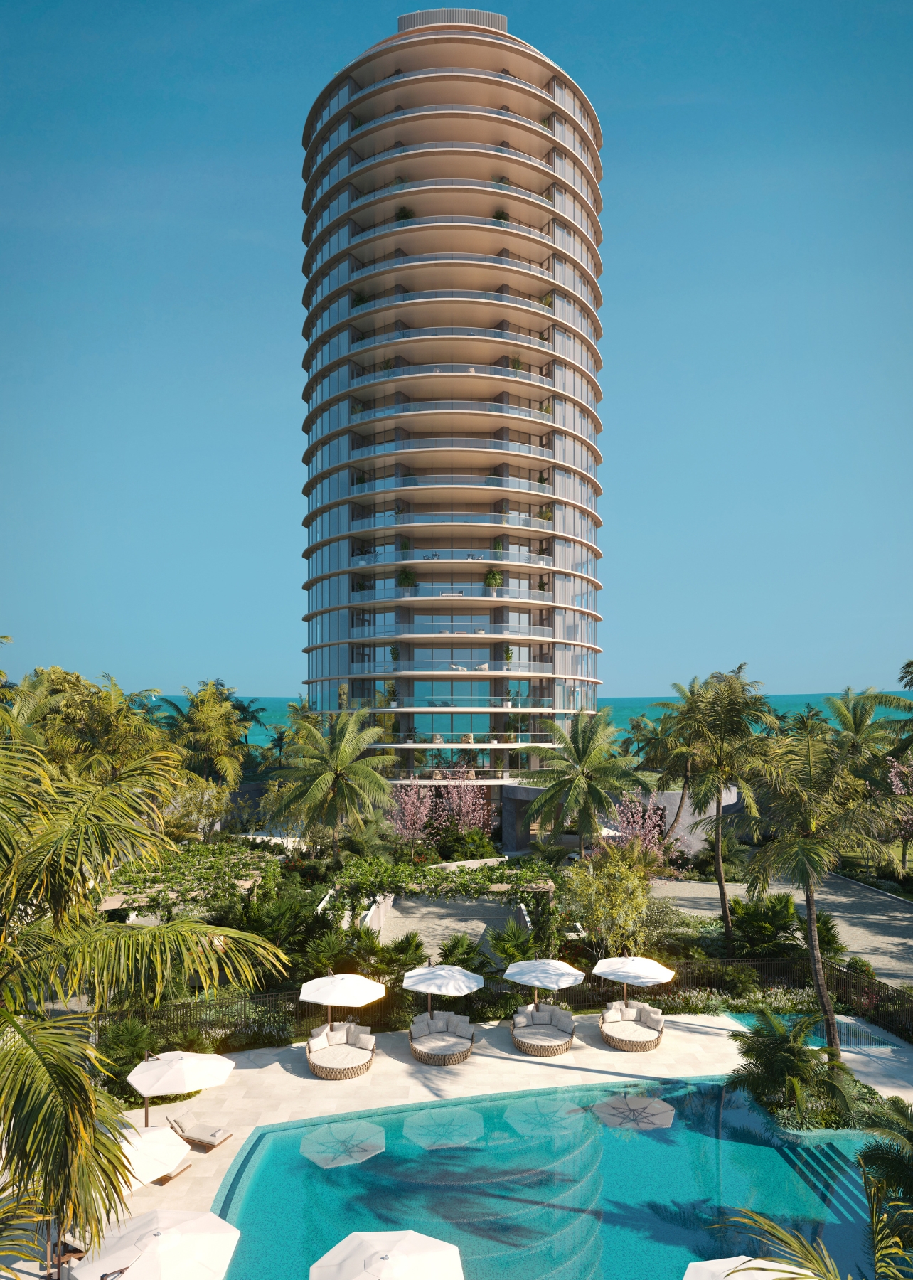Rivage Bal Harbour Condominium full building view with pool and lounge chairs and umbrellas