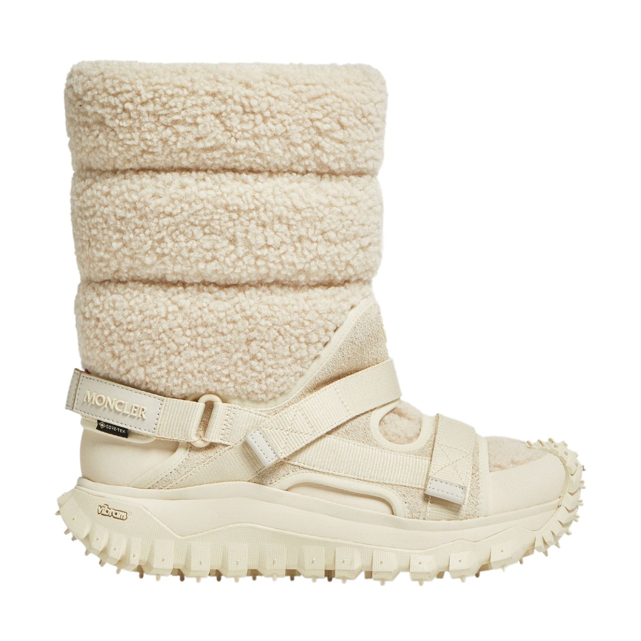 Moncler white faux fur boots in desert sand