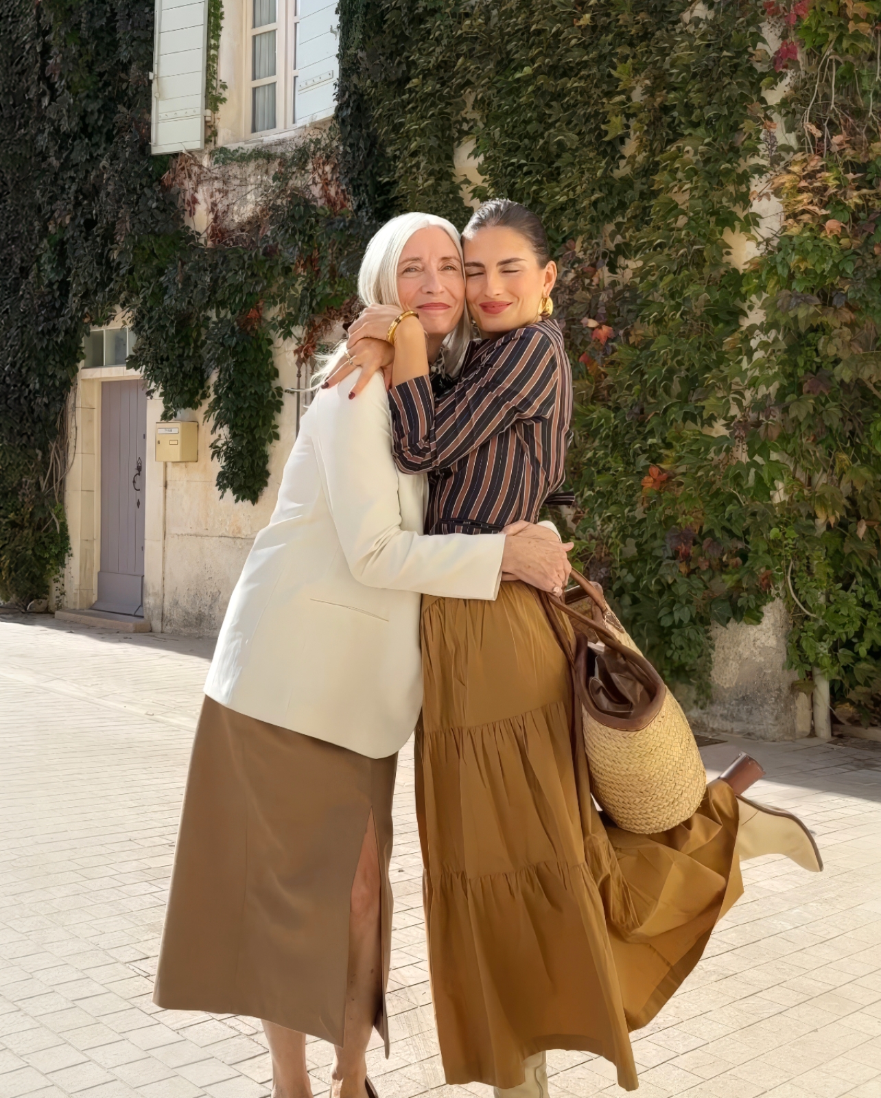 Portrait of Trudy Crane and Chloé Crane-Leroux hugging