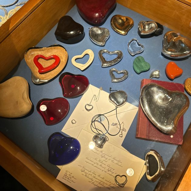 Box of glass hearts in various colors