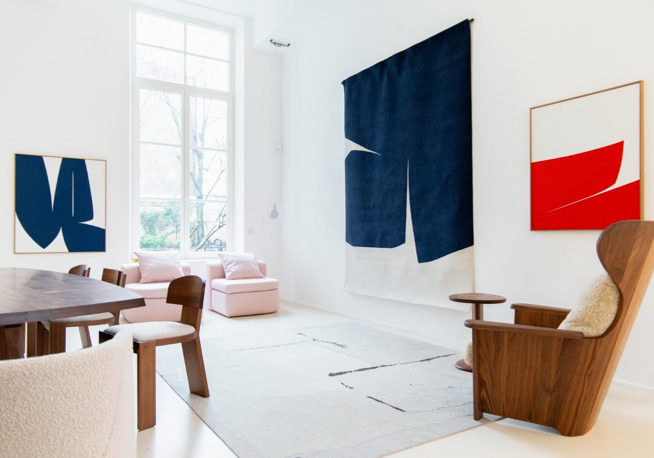 Living Room with three abstract paintings hanging