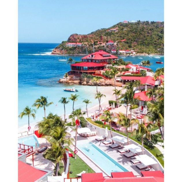 Aerial view of Eden Roc with ocean view and red roof buildings