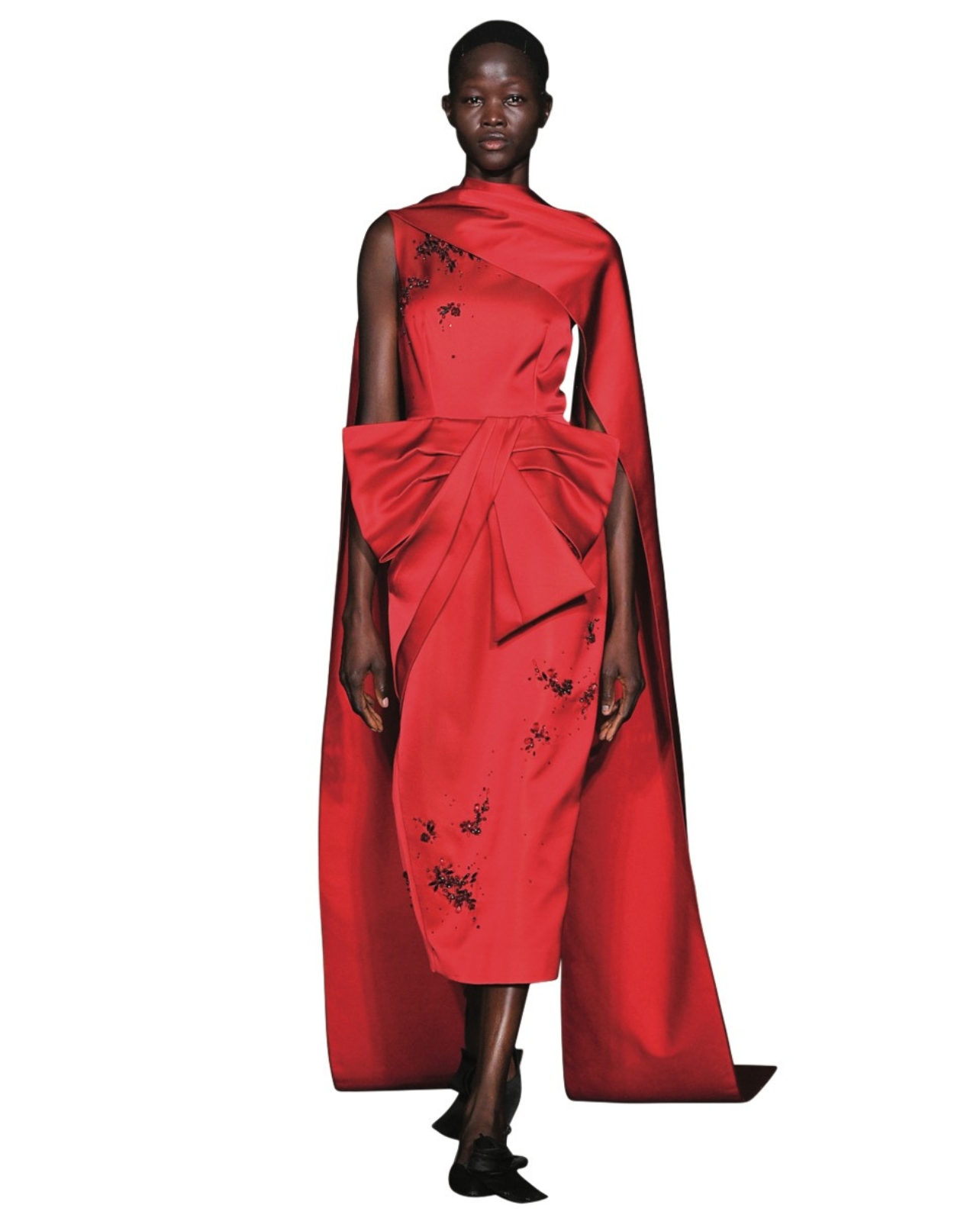 Erdem model wearing red dress