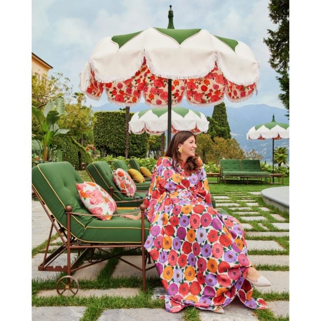 Portrait of Valentina de Santis sitting by pool in colorful outfit