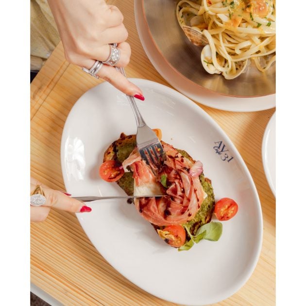 Spread of Dishes-Hand with jewelry cutting