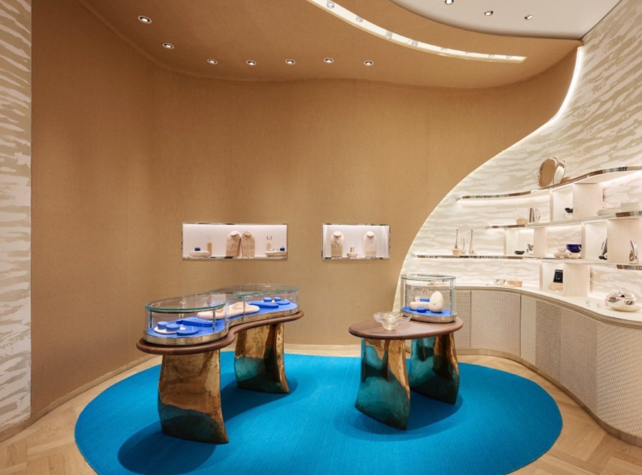 Tiffany & Co. New boutique space with jewelry counters on a blue carpet