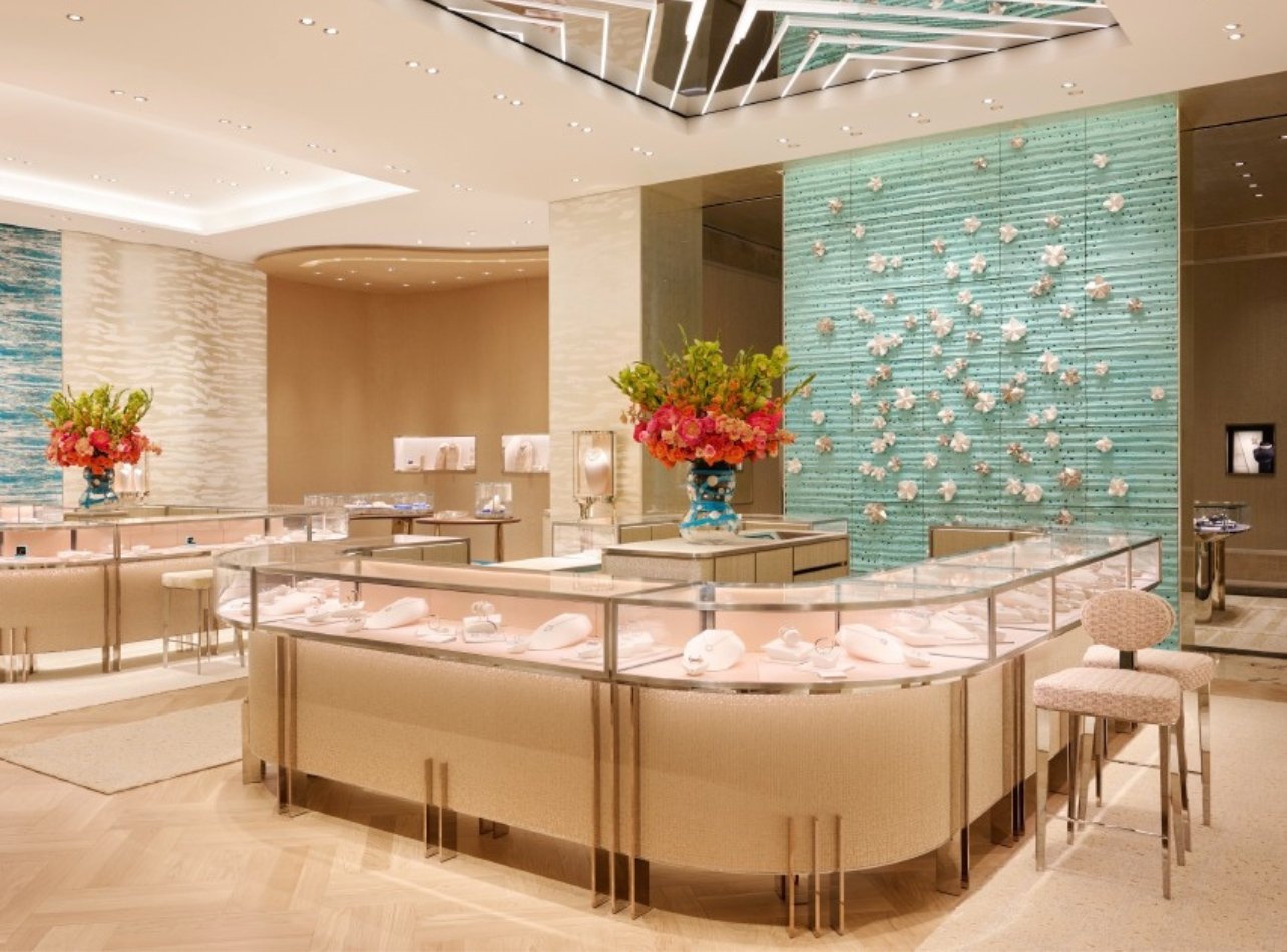 Tiffany & Co. New boutique space with jewelry counter and blue art piece in the back