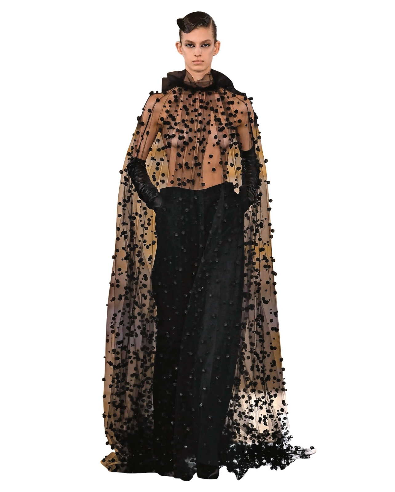 Valentino model wearing black gown