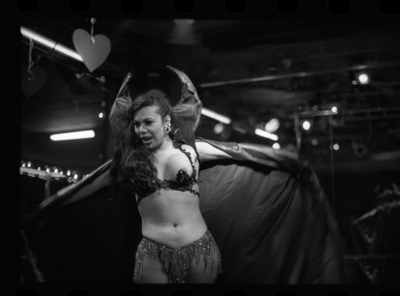 Black and white photograph of a woman dancing