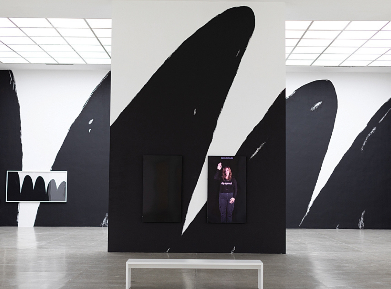 Art installation with white and black walls