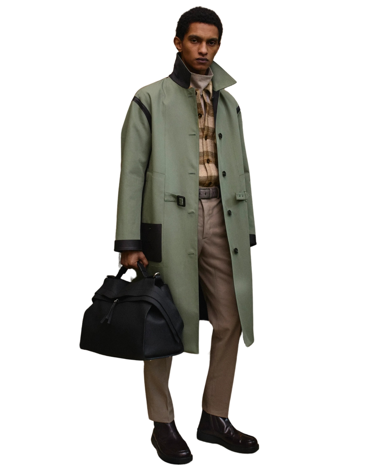 Tod’s male model wearing a green coat