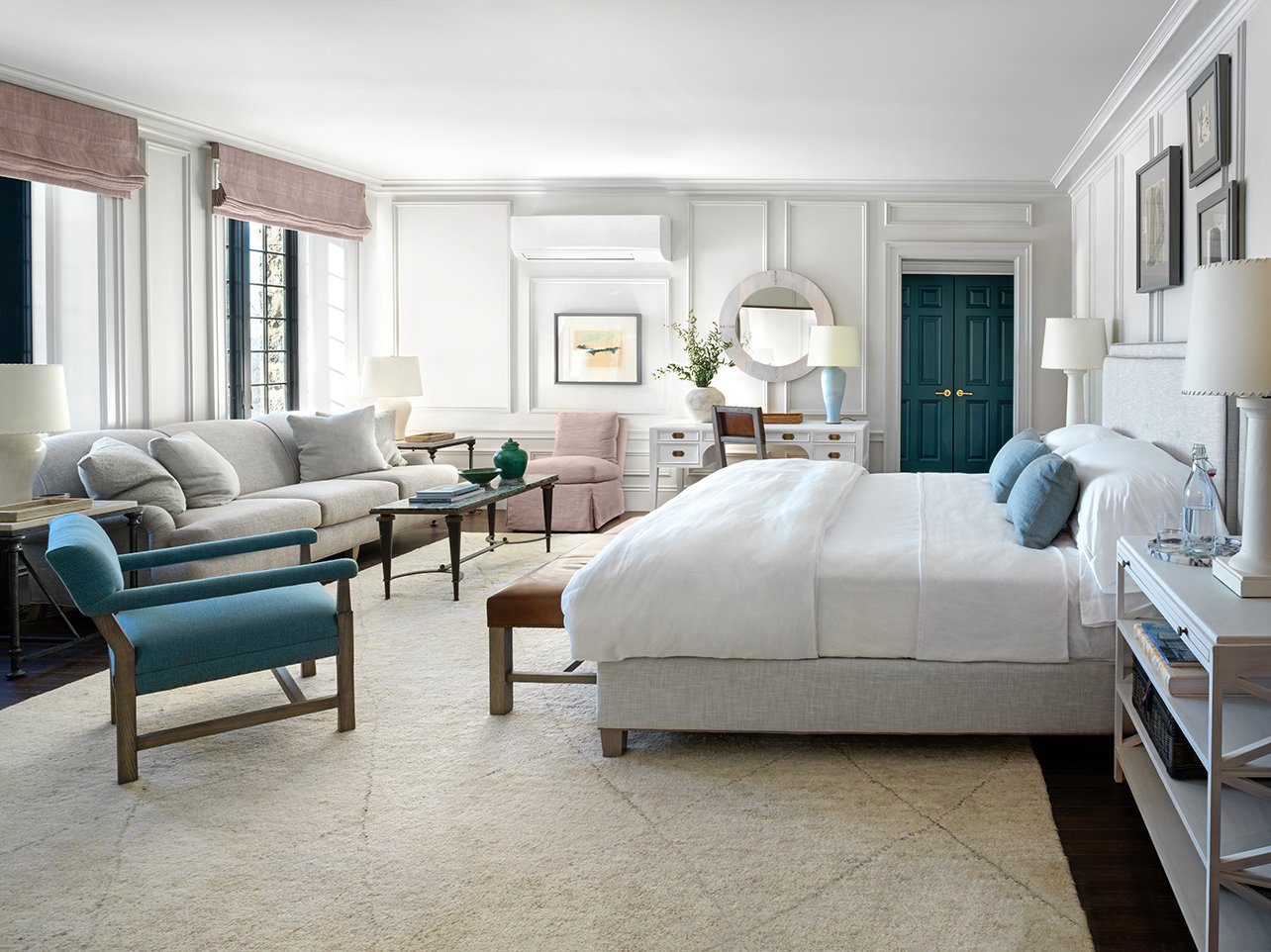 Hotel room with pink and blue chairs