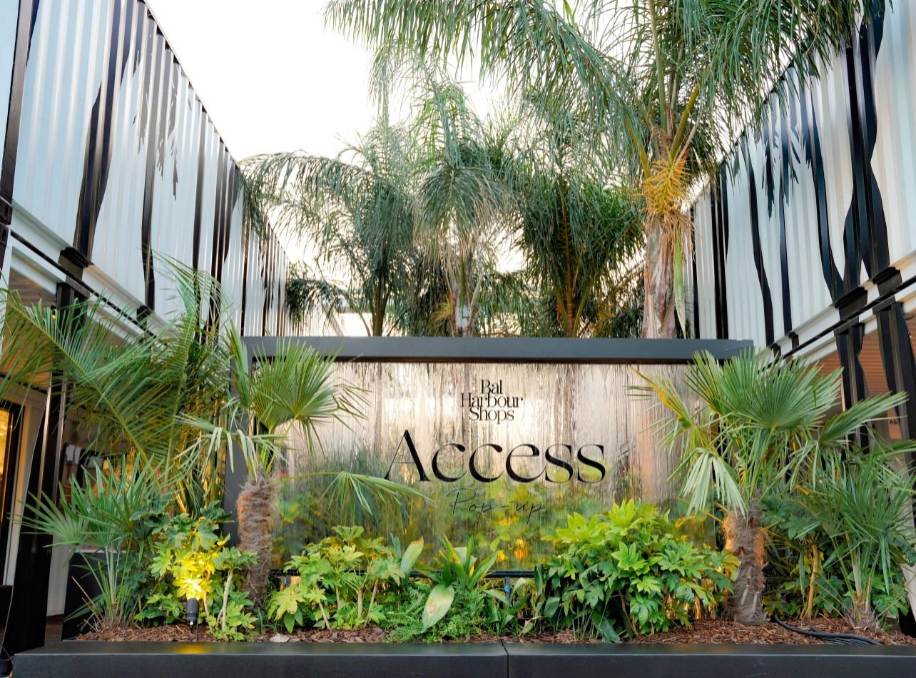 Bal Harbour Shops Access Pop-up signage surrounded by greenery