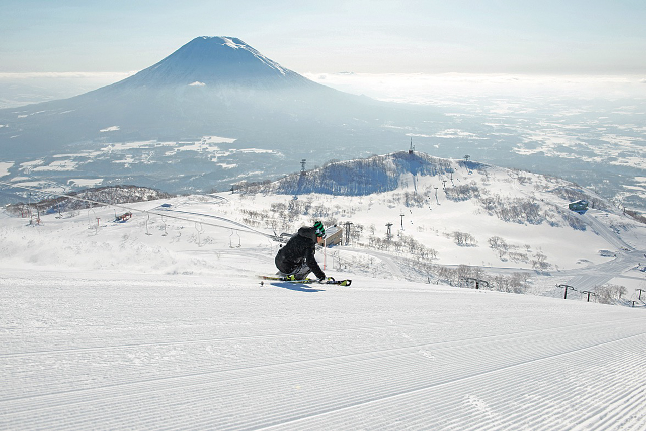 Skier going down slopes