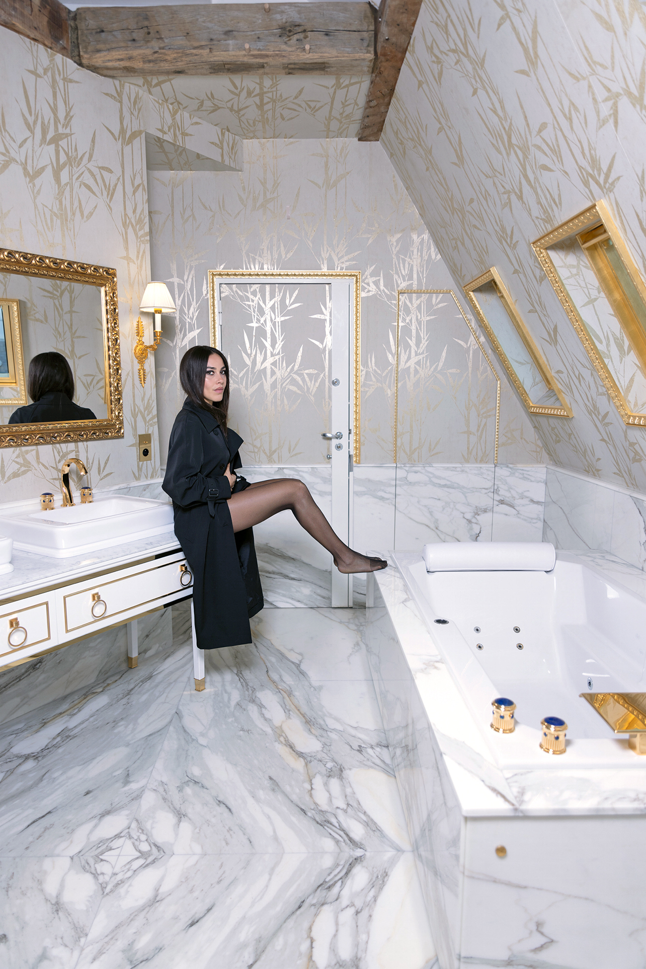 Portrait of Devorah Ezagui in a bathroom with marble floors